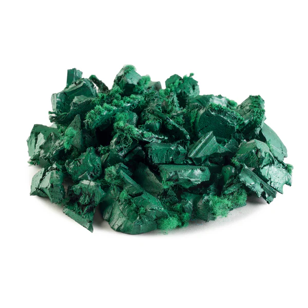 A pile of green, rough-textured solid rubber chunks arranged on a white background.